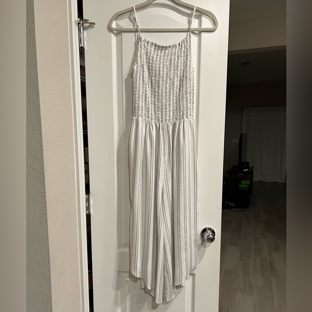 Sleeveless white with blue/beige stripes cropped jumpsuit by Mimi Chica